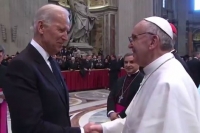 Who's that guy shaking the Pope's hand?